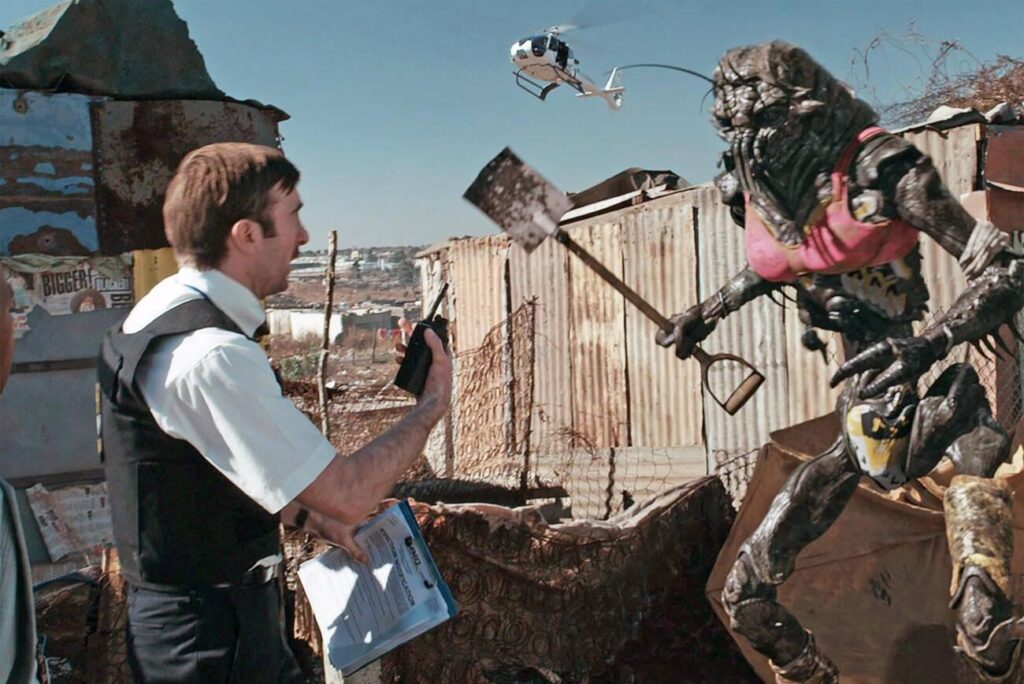 DISTRICT 9, Sharlto Copley 